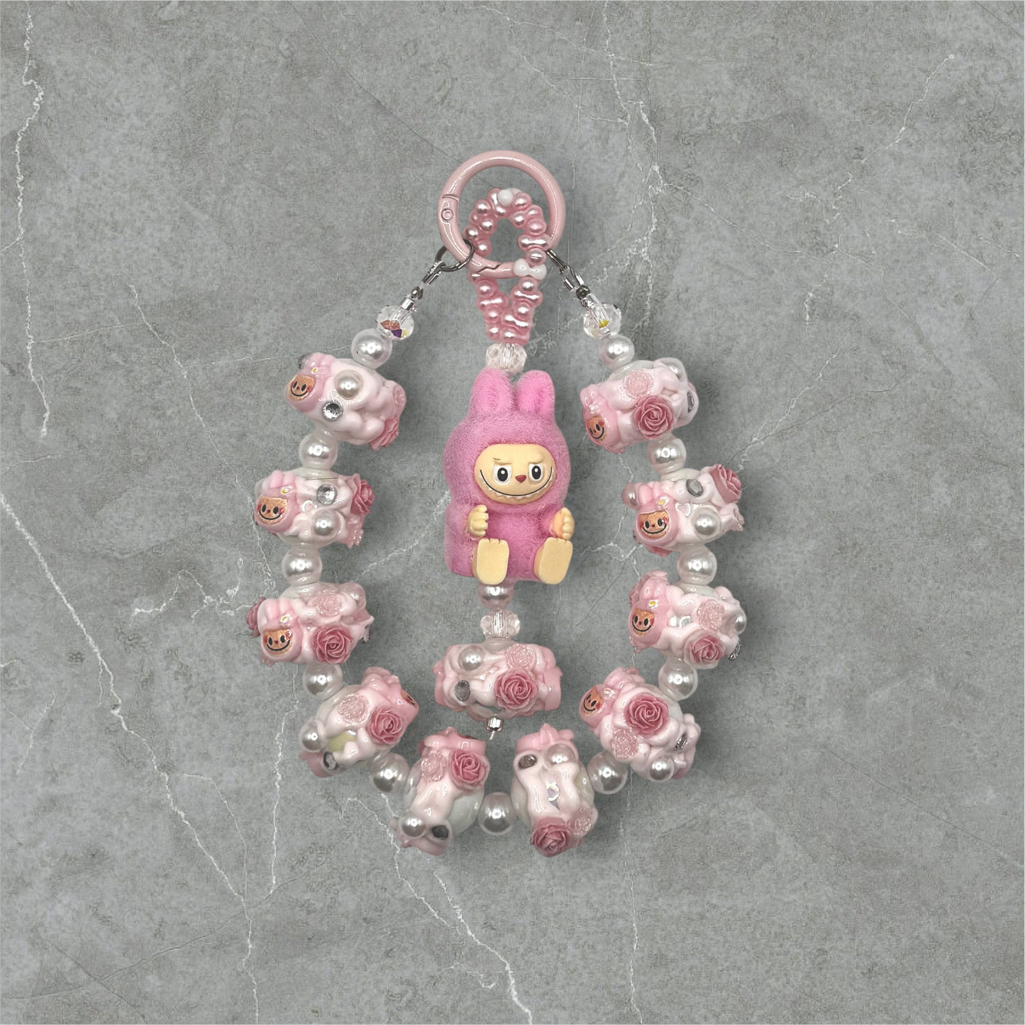 Pink Labubu sitting