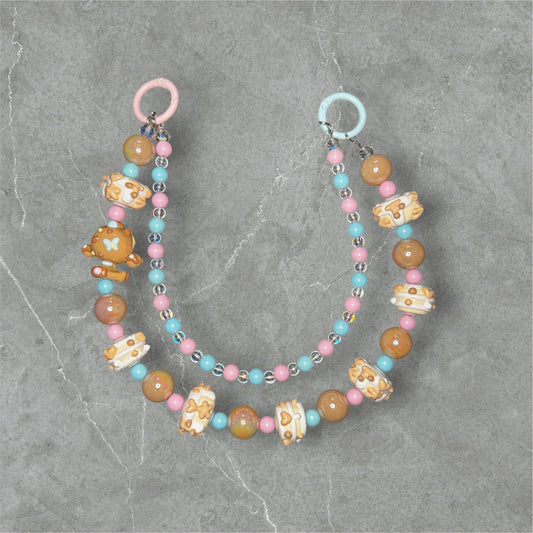 Custom double loop keychain with hand painted Skull Panda doll and beads